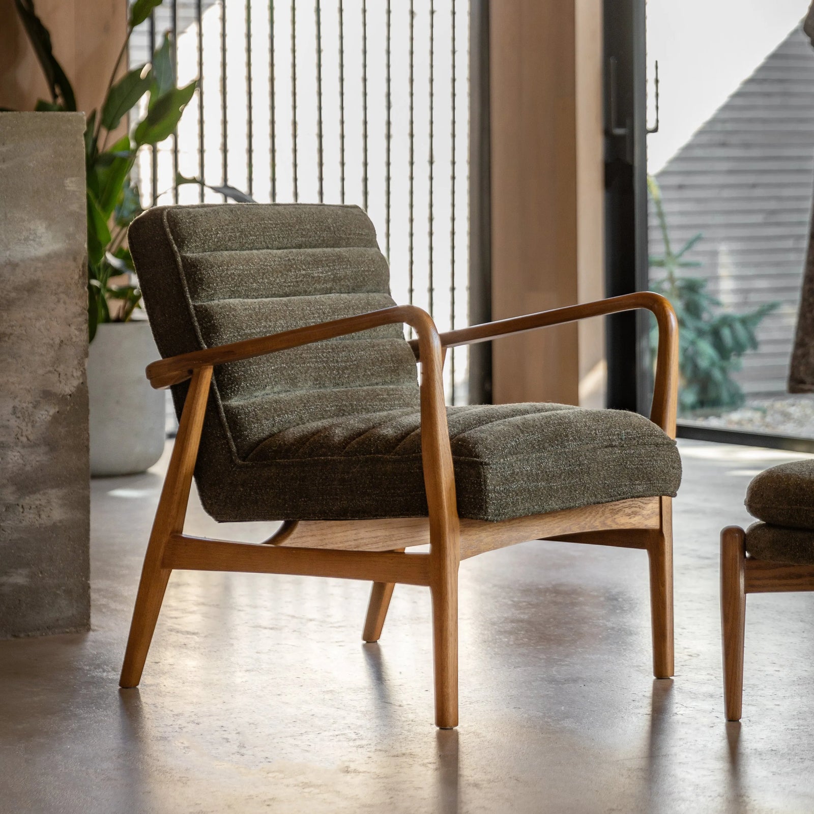 Fauteuil Datsun en tissu bouclé vert